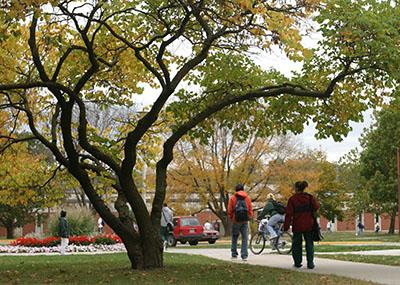 Students walk through the Northwest campus during the fall. 